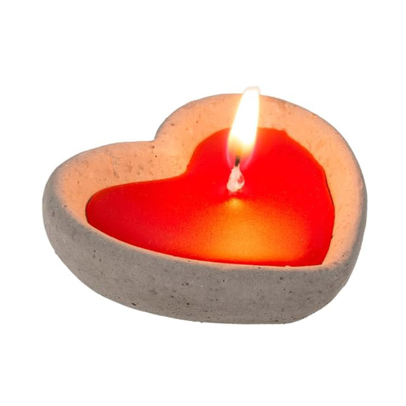 2 decorative red heart candles