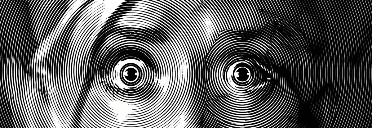 Gros plan stylisé en noir et blanc représentant deux yeux écarquillés formés par des lignes gravées en spirale