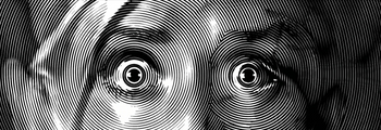 Gros plan stylisé en noir et blanc représentant deux yeux écarquillés formés par des lignes gravées en spirale