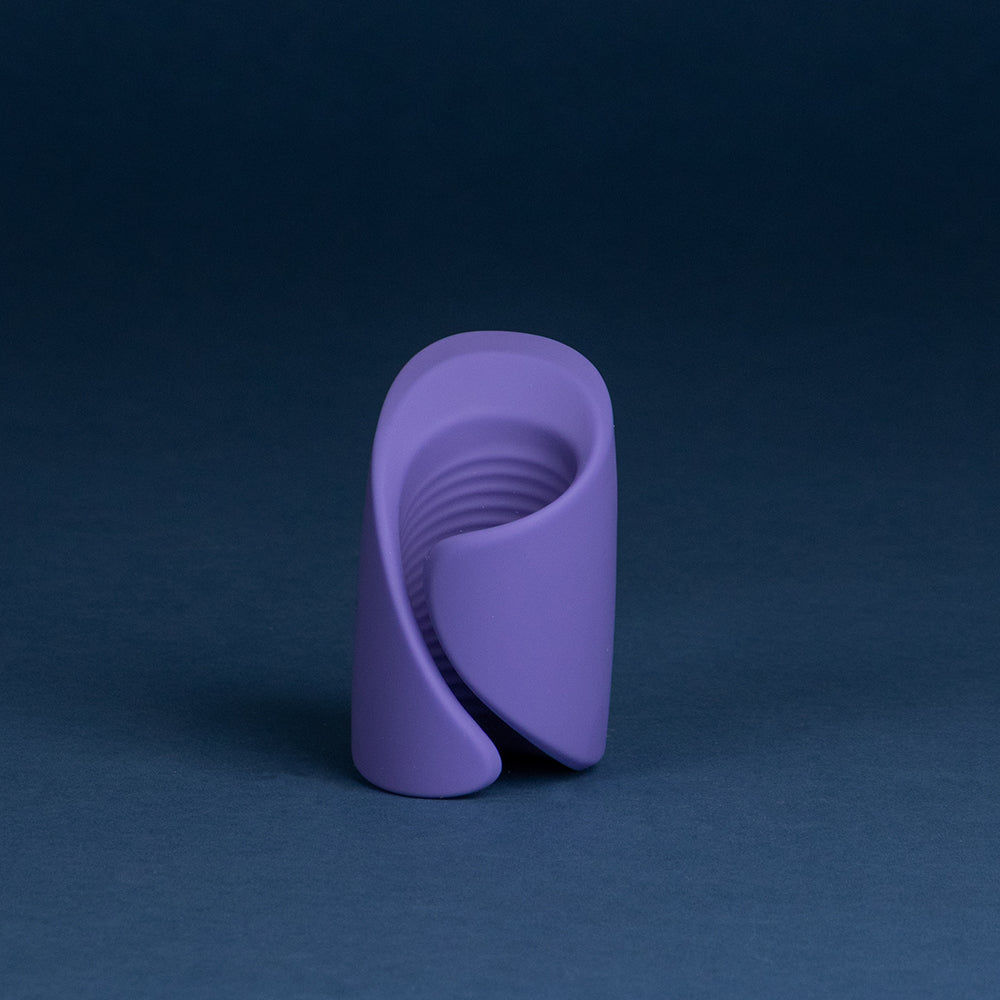 Klopfender Masturbator - Ein lila Objekt auf blauem Hintergrund
