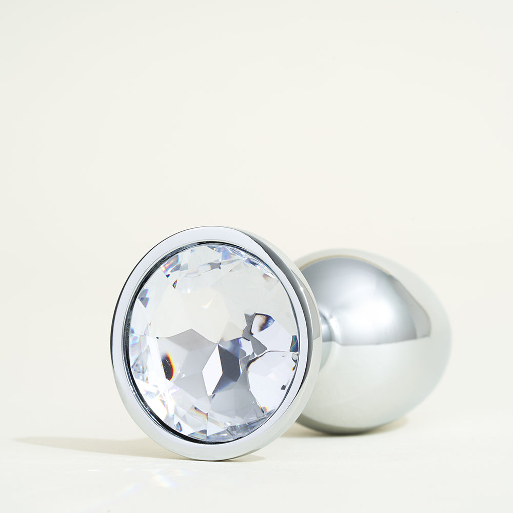 Metal plug with rhinestone diamond butt