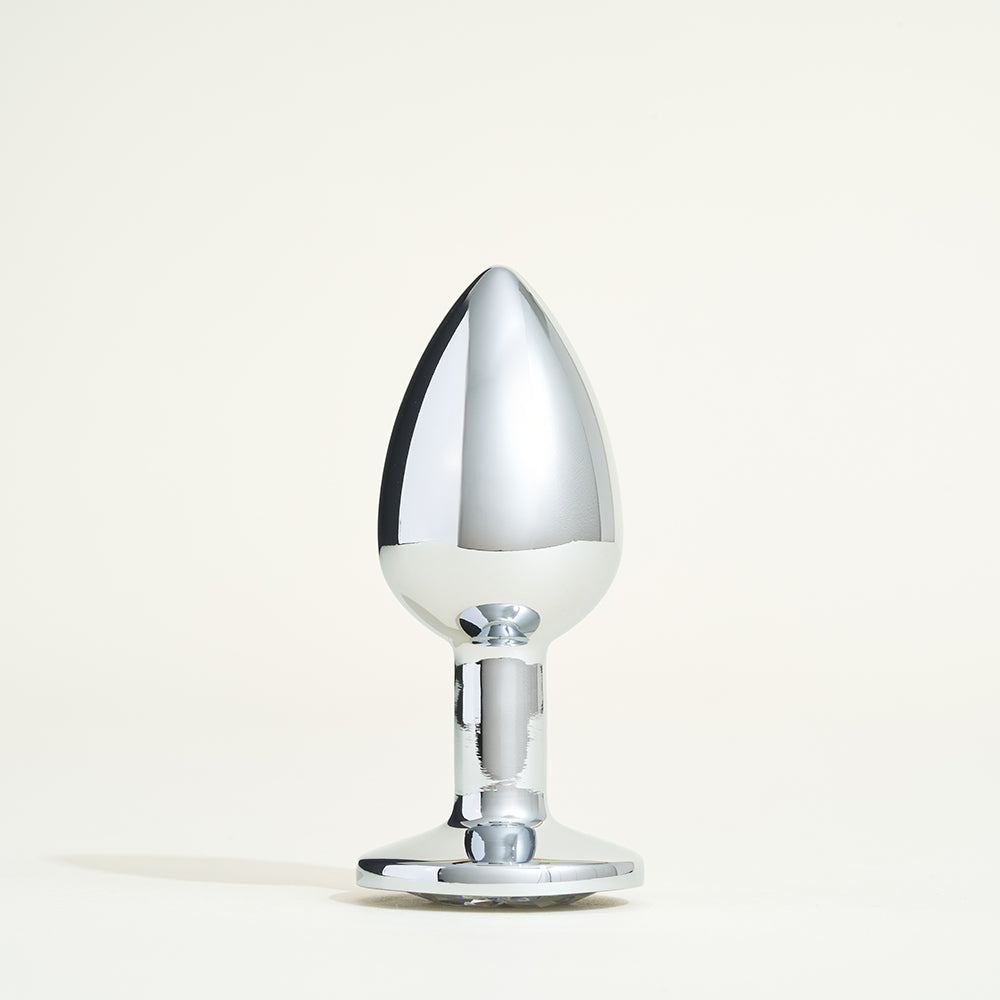 Metal plug with rhinestone diamond butt