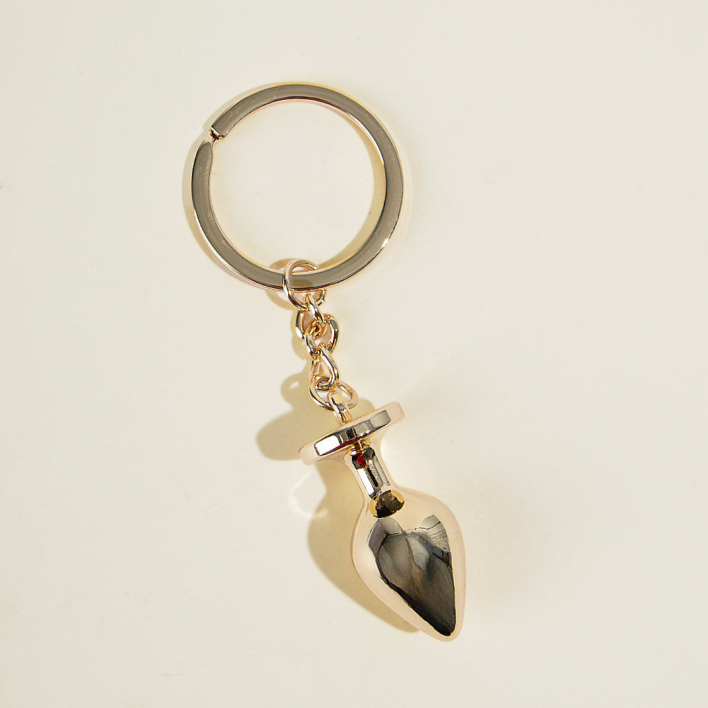 Porte-clé plug d'or