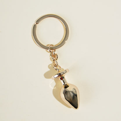 Porte-clé plug d'or