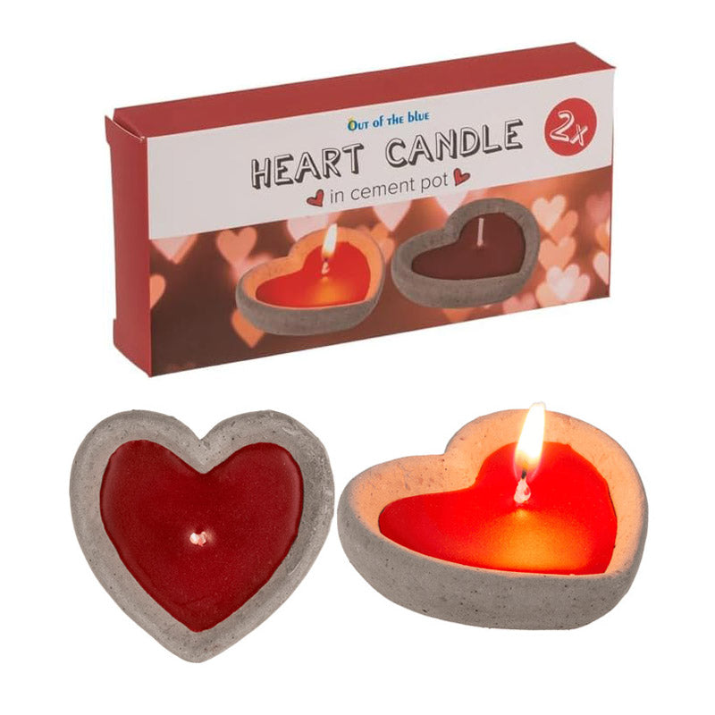 2 decorative red heart candles